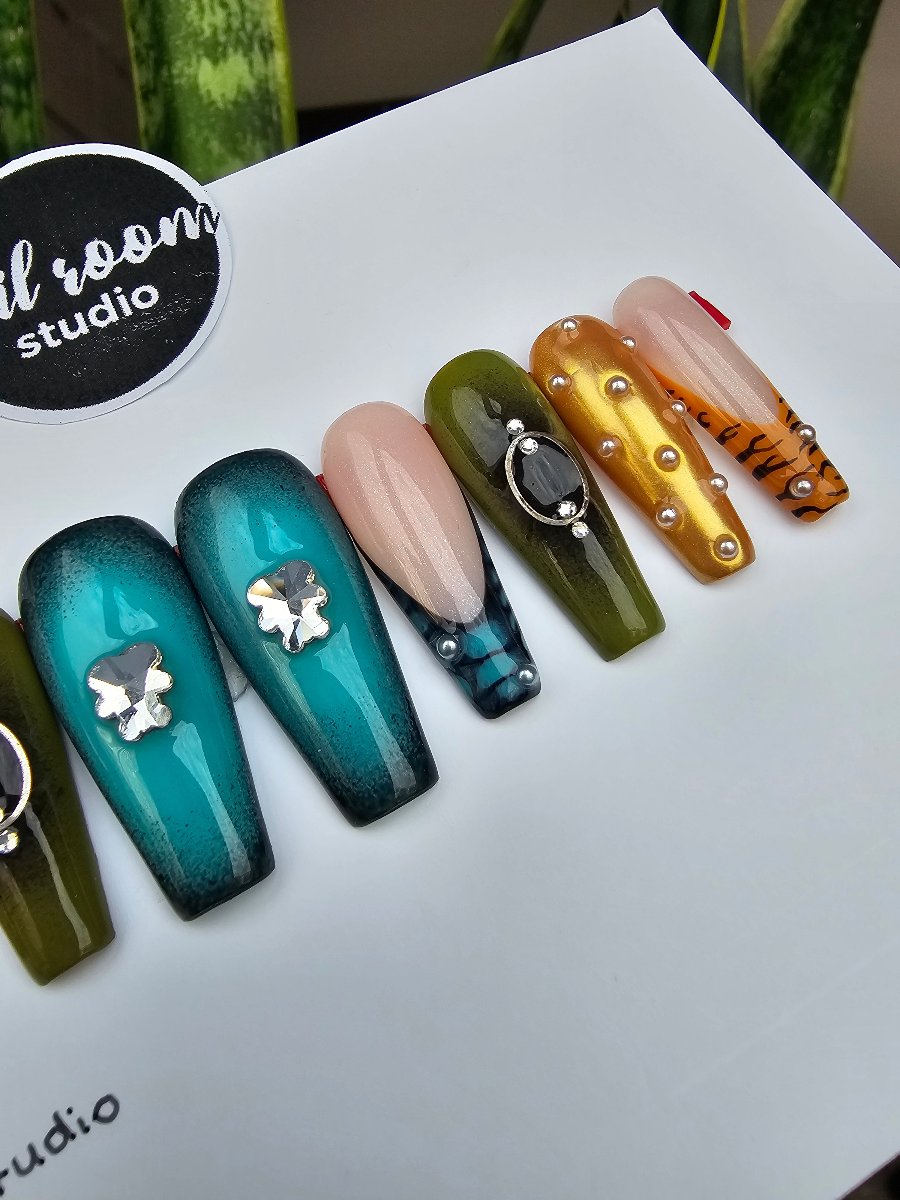 Wild animal prints like leopard, zebra, and tiger, combined with French tips, blue-black ombre, and silver Swarovski skull crystals, perfect for summer or a gothic vibe, custom press-on nails for hands and feet hand crafted from Nail Room Studio
