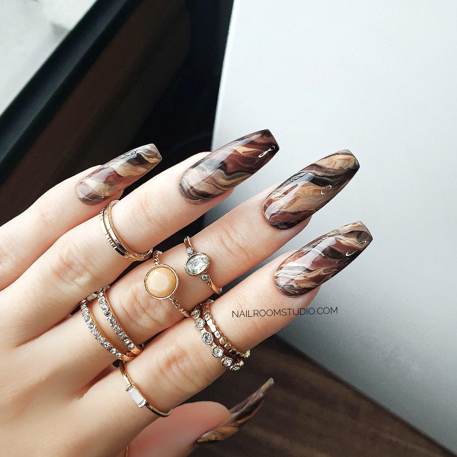 Beige and brown marbled autumn nails with hand-painted water painting design, perfect for fall, available in long, medium, or short shapes, ideal for dark skin tones by Nail Room Studio