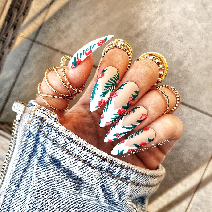 Sophisticated French nails adorned with intricate botanical and floral patterns, perfect for nature lovers by Nail Room Studio
