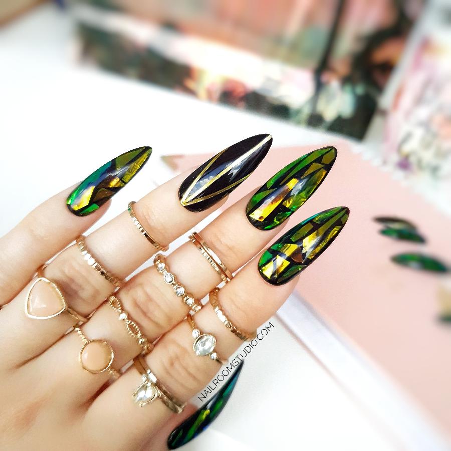 Long stiletto custom press on nails with broken glass gold and green deep glossy effect from Nail Room Studio