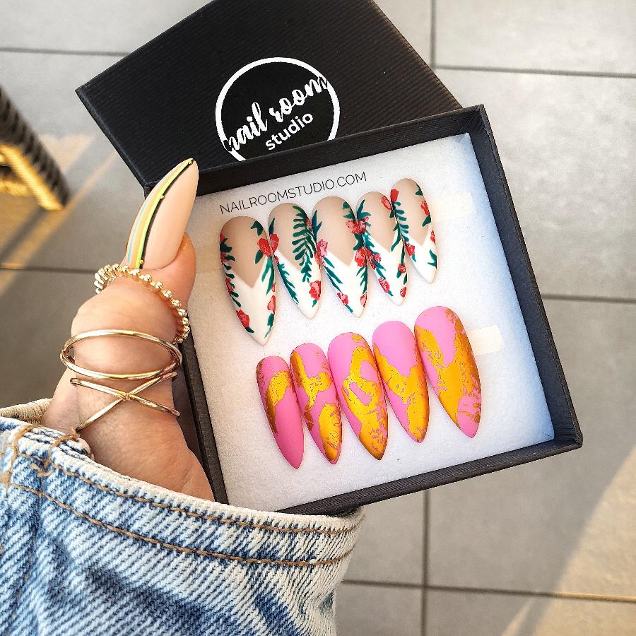 Elegant French nails with delicate floral and leaf designs, creating a fresh and natural look by Nail Room Studio
