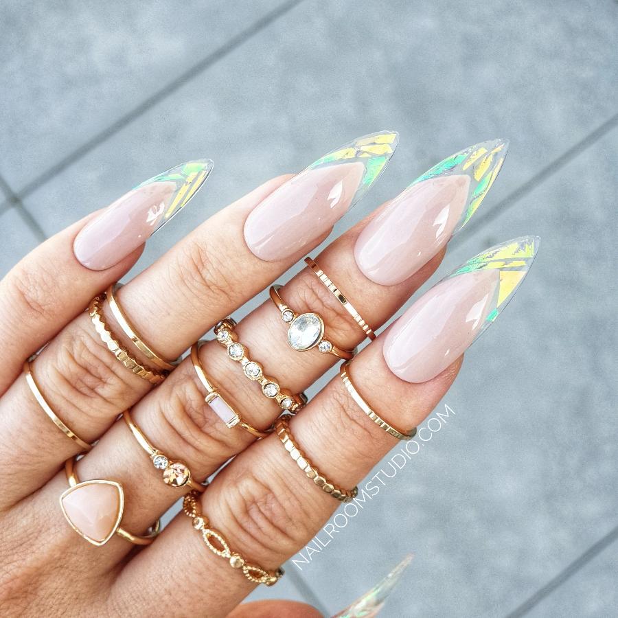 Luxury nude french stiletto nails with a transparent broken glass effect and opalescent details by Nail Room Studio