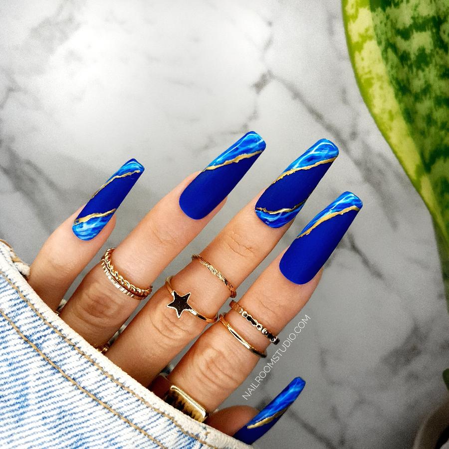 Glamorous Deep Blue Nails with Gold Touch