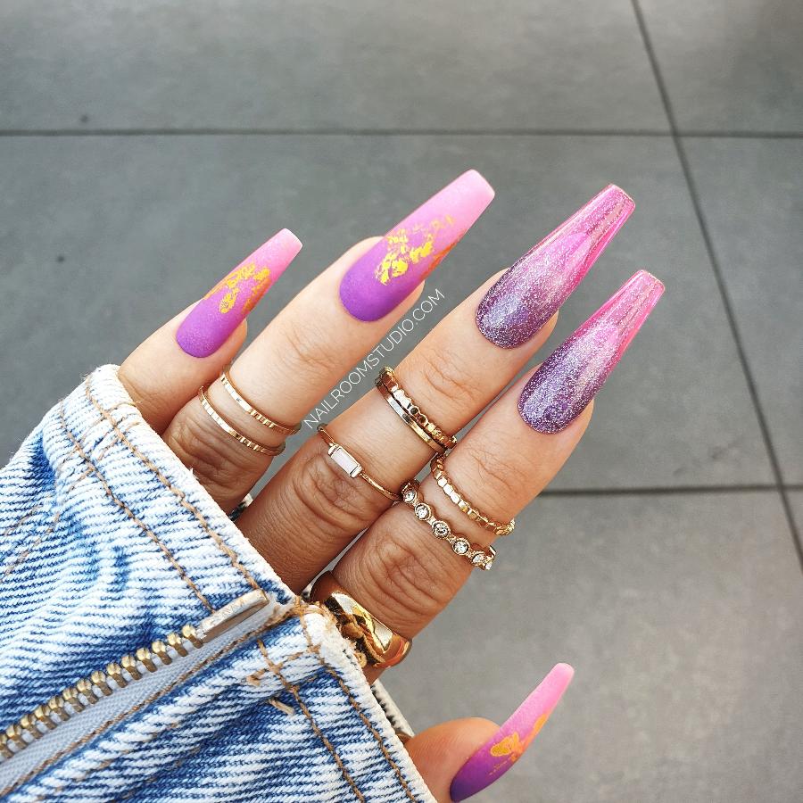 Beautiful pink and purple ombre nails with a matte finish and gold chrome accents, perfect for a stylish summer look, long sculpted coffin nails set from Nail Room Studio