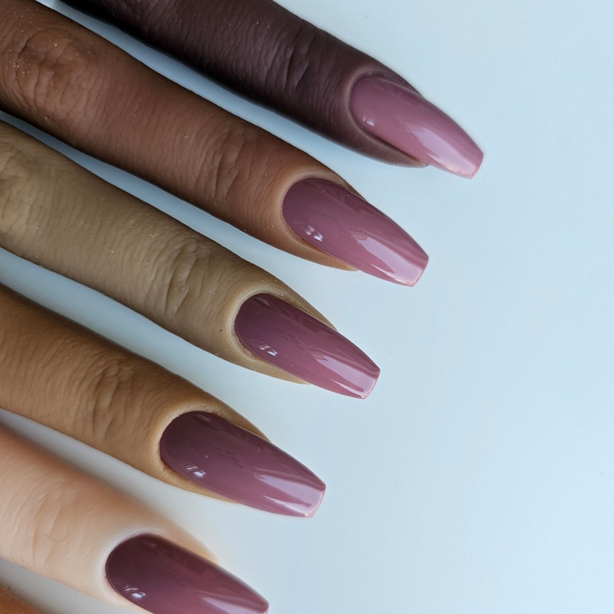 Intensely pigmented mauve faux nails in a unique shade blending beige and purple, perfect for a standout style custom matching toes and finger hands nails pressons