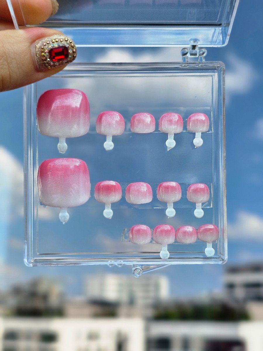 Press-On Toes set in pink-white ombre with a glossy finish, create a unique pedicure in just minutes