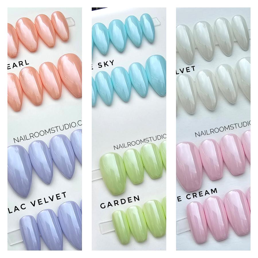 Beautifully designed pearl nails ready for shipment, perfect for adding elegance to any outfit or occasion, include colors: peach, blue, perl, lilac, green and pink ummer glazed fake tips shades