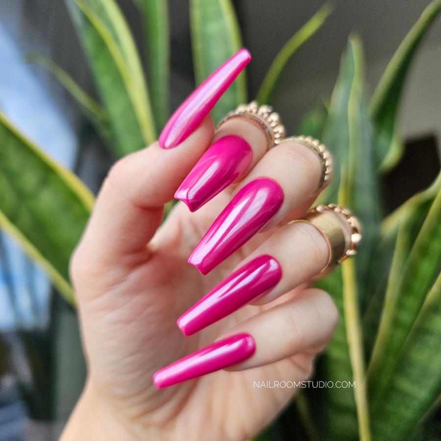 Magnolia-colored press-on nails in a long ballerina shape, featuring a chrome shimmer and high-gloss glaze; salon quality, packed professionally in a ten-nail set