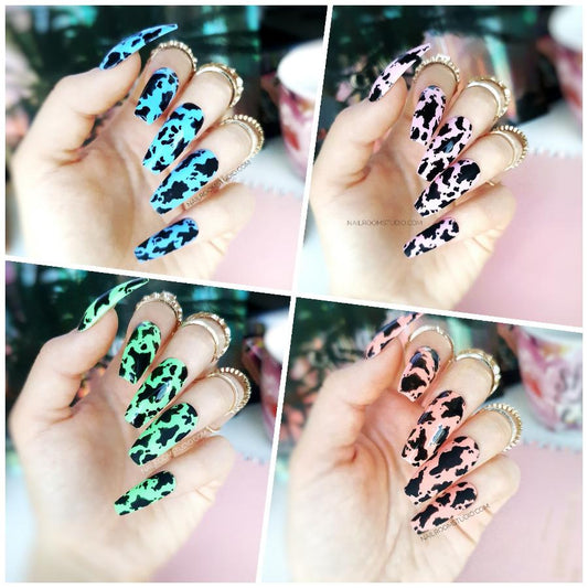 Deepy Cow nails featuring a vibrant animal print in summer tones of blue, green, peach, and pink