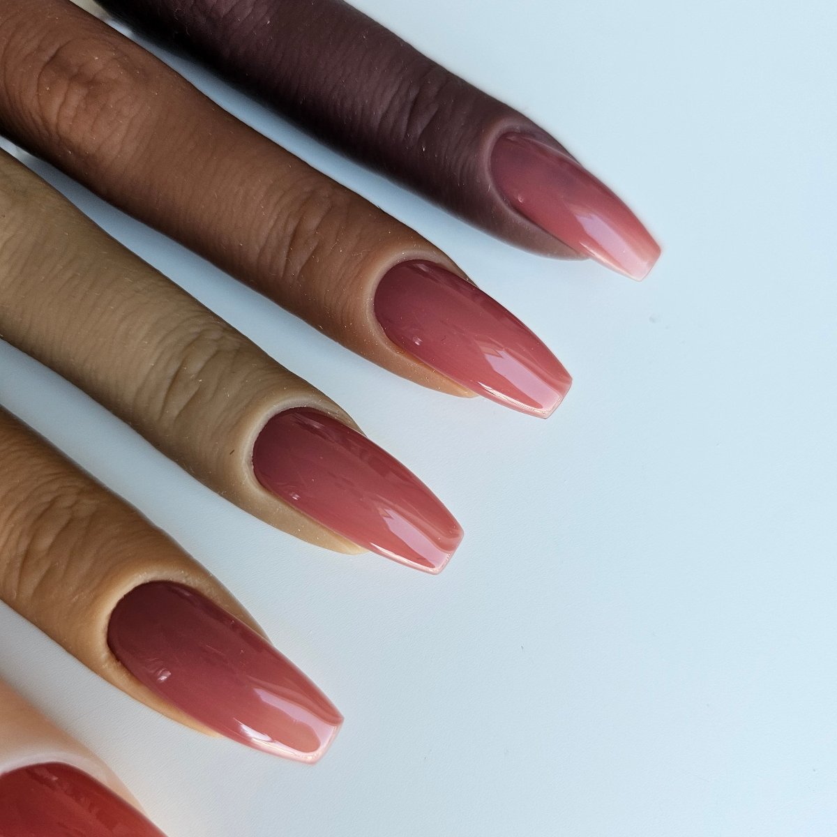 Rich dusty pink brown PressOn nails with plum tones, elegant artificial nails swatch - great for seasonal looks and perfect coverage