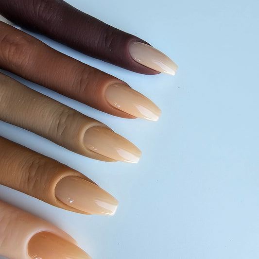 Soft beige artificial nails with a delicate finish, perfect for a sophisticated, timeless style, basic nails in solid color matched to all skin tones, for manicure and pedicure
