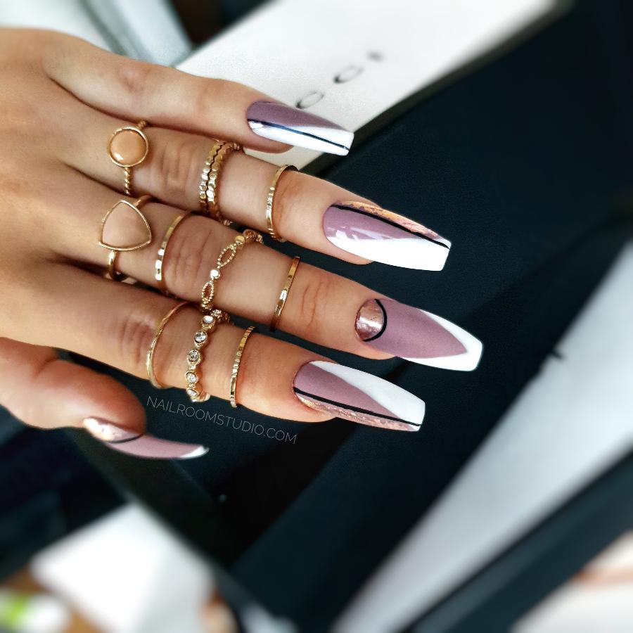 Mauve matte nails with slanted and symmetrical French tips, accented with black lines and silver glitter for a classic and elegant look