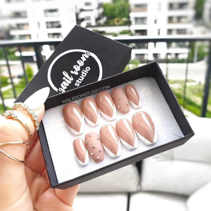 Standard length press on nails in sharp french style with small crystals