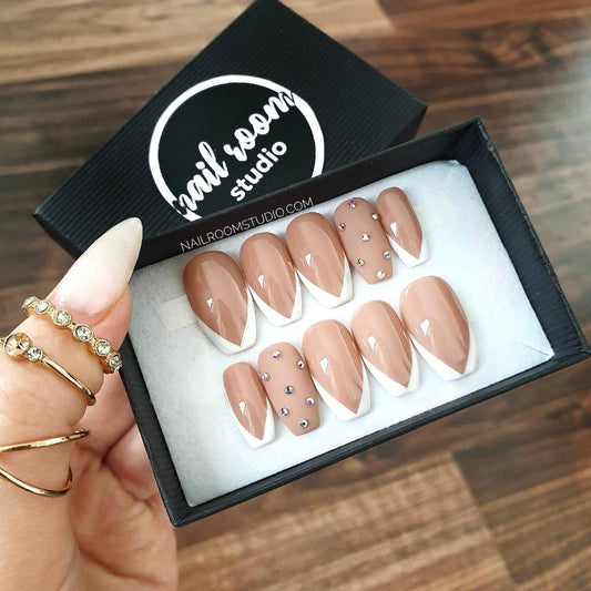 Standard length in french style, with opal crystals and natural beige nail bed color