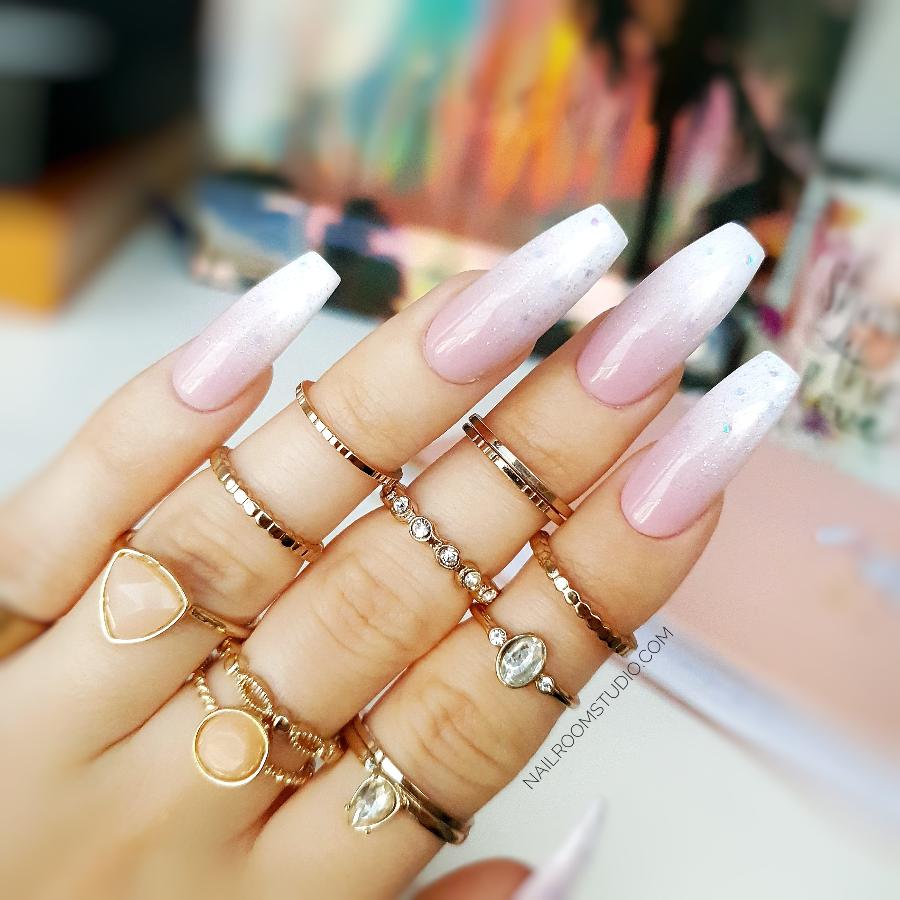 Long coffin nails in a pink and white baby boomer style, with delicate shimmer by Nail Room Studio