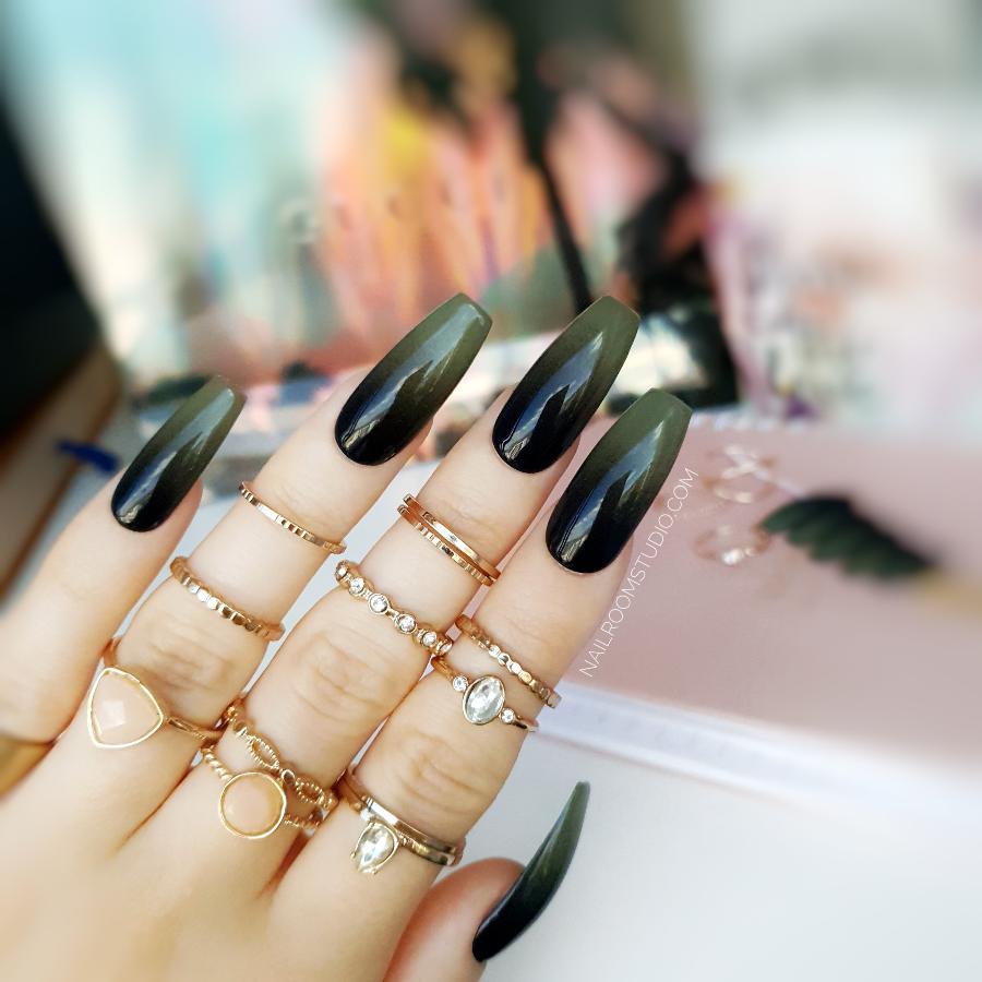 Fake nails in dark ombre style, matte and glossy finish, black and olive green ombre long coffin