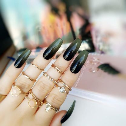 Fake nails in dark ombre style, matte and glossy finish, black and olive green ombre long coffin