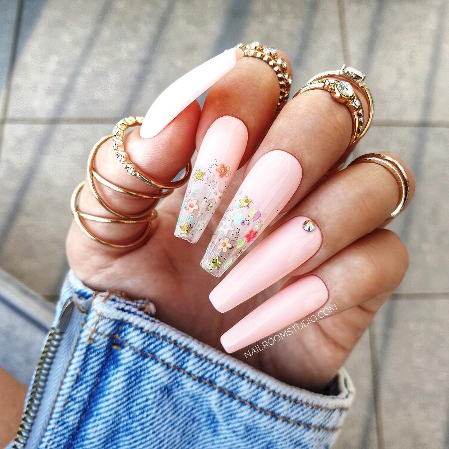 Sculpted long coffin nails in pastel pink ombre with glitter, partially transparent, for a light and refreshing spring vibe by Nail Room Studio