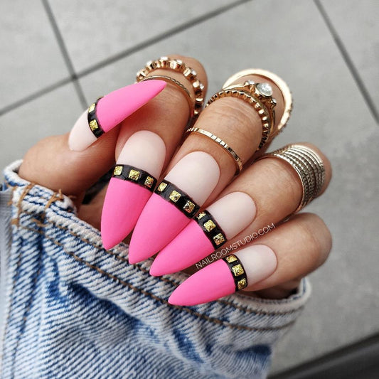 Neon pink nails with bold stripes, designed for lovers of kink and alternative styles by Nail Room Studio