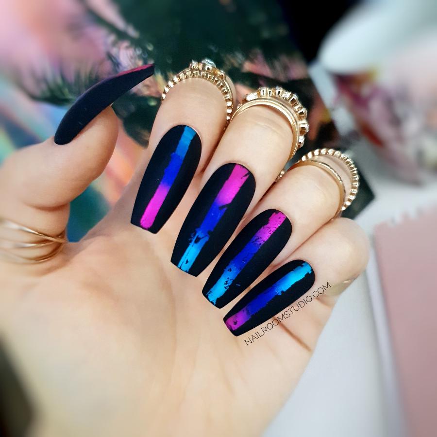 Bold black coffin nails with matte finish, detailed with pink and blue chrome by Nail Room Studio