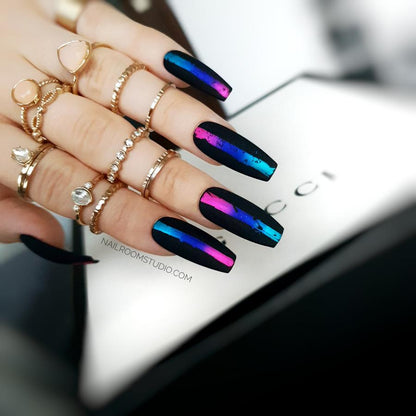 Long black coffin nails with matte finish and chrome accents in pink and blue by Nail Room Studio