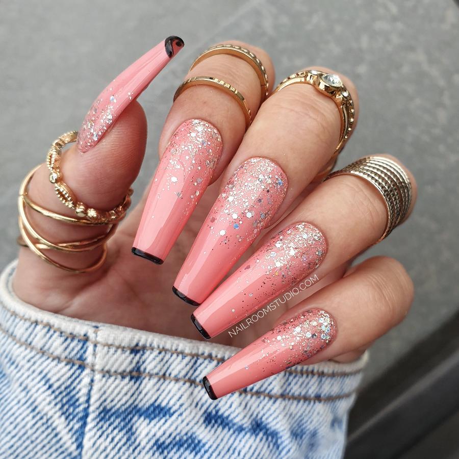 Nail Room Studio glitter peach ombre nails with black French tips, perfect for a chic and fashionable look, available for both hands and feet, matching manicure and pedicure sets