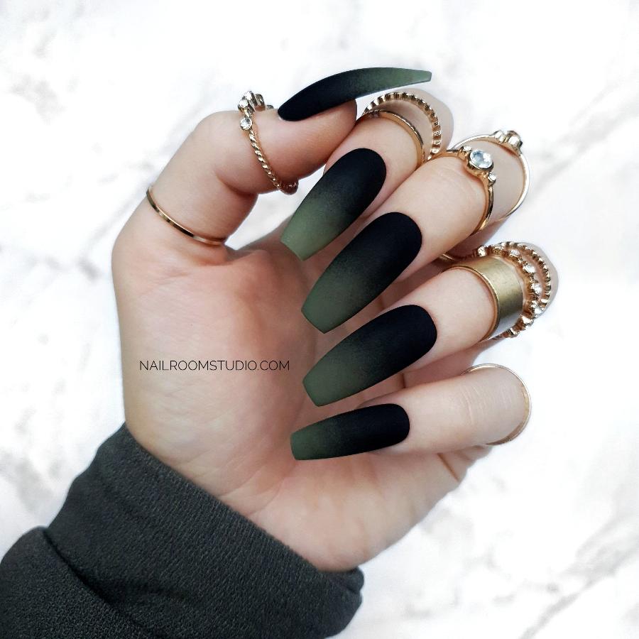 Green and black camo-inspired coffin nails with ombre matte and glossy finish by Nail Room Studio