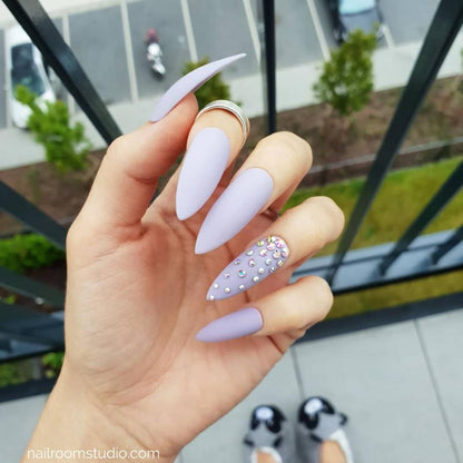 Lilac matte stiletto nails with elegant Swarovski crystals by Nail Room Studio