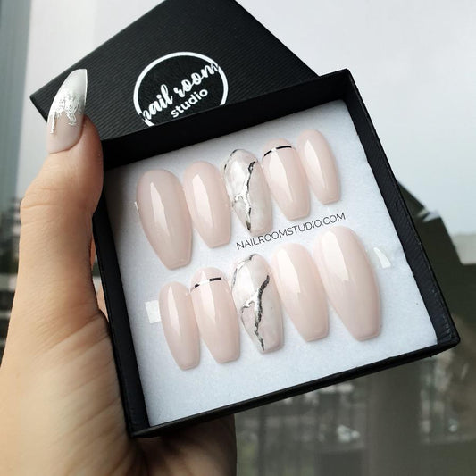 Powder pink nude press-on nails with a touch of white marble and gold crumb marble accents, perfect for a natural and elegant look, ideal for any occasion