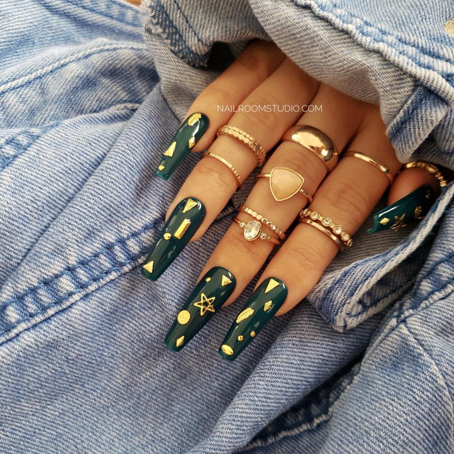 Nail Room Studio sculpted coffin nails in dark bottle green with gold charms and celestial details like stars and moons, witchy gothic style press-on nails for toes and hands