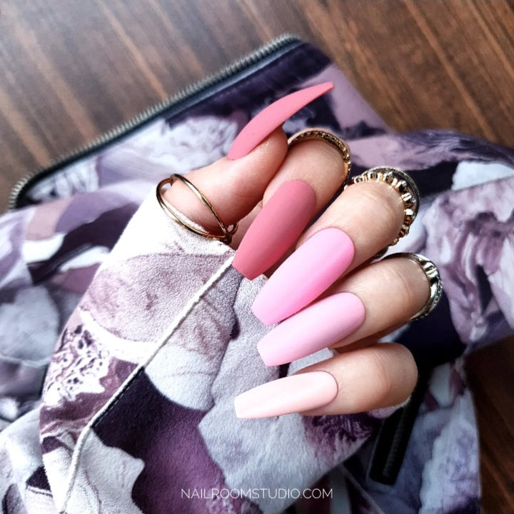 Pink nails with many shade, long coffin nails with matte finish, best artificial tips from Nail Room Studio