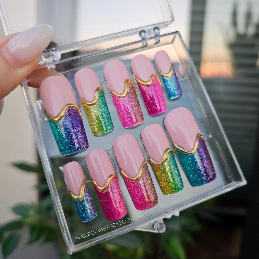 Colorful gradient long pink square press-on nails with jelly texture, featuring beautifully blended rainbow tips and intricate 3D golden lines, adding a playful touch to your look