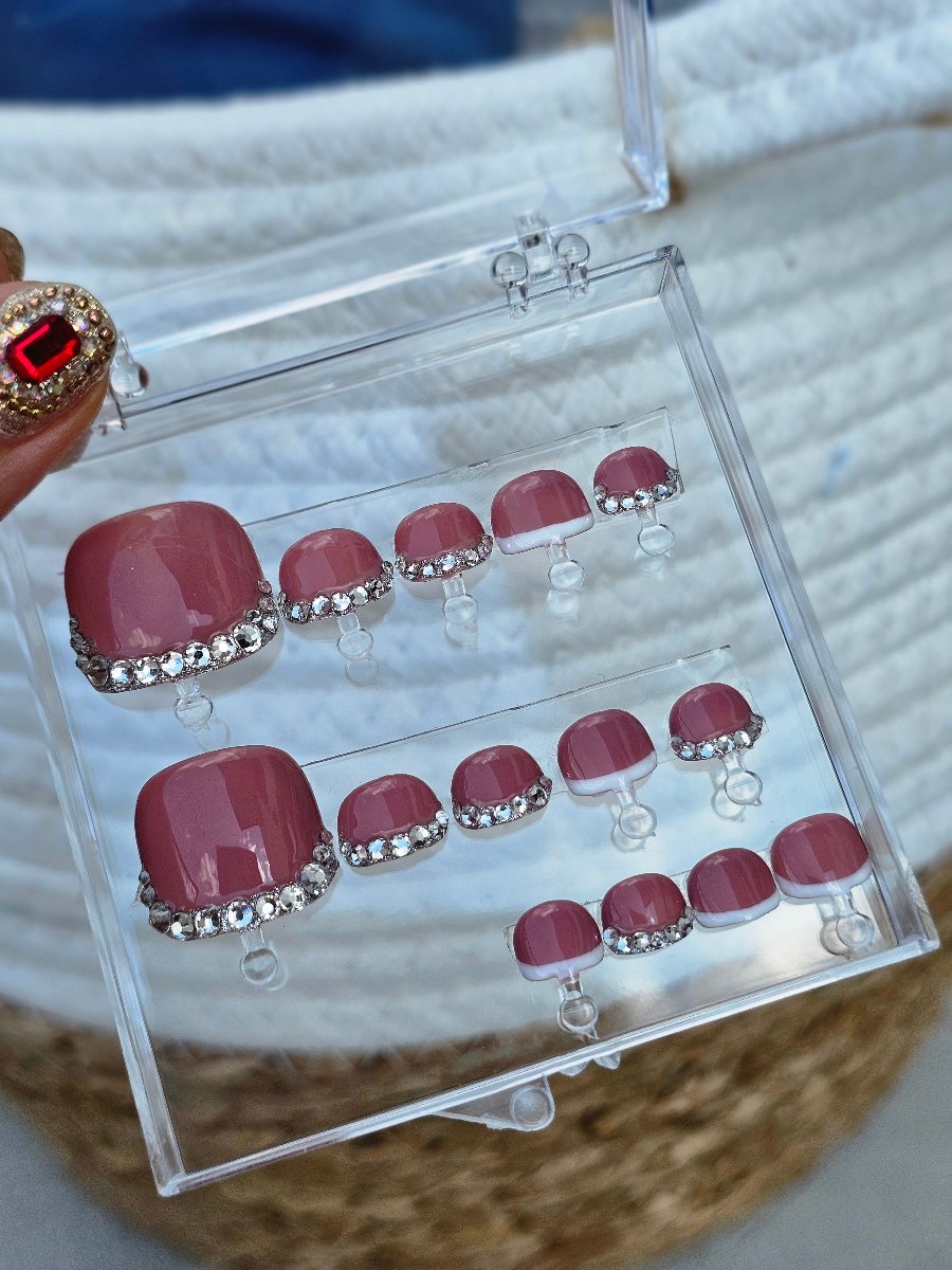 Press-On Toes set featuring a French tip and Swarovski crystals, convenient option for a DIY pedicure