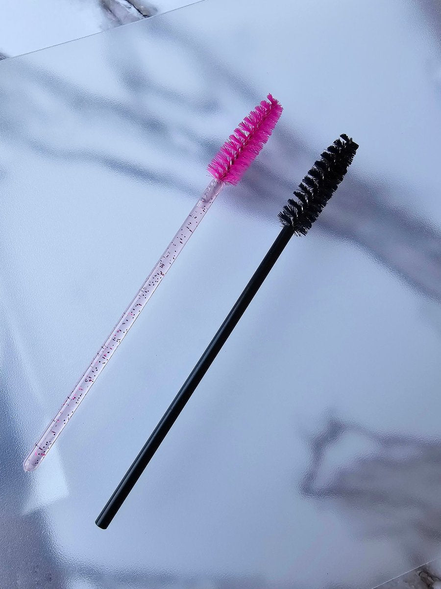 Black and pink lash brush, ideal for detangling and grooming lash extensions and natural lashes