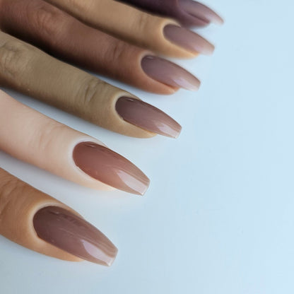 Delicate brown PressOn nails with partial coverage, ideal for a natural French look on darker skin tones