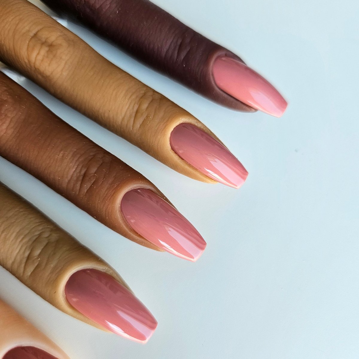 Natural pink PressOn nails with a reddish tint, well-pigmented and perfect for a standout, versatile manicure made to order from faux tips shop online