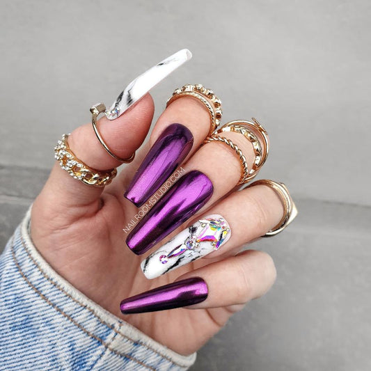 Exquisite purple and pink chrome nails with marble accents on one nail and AB Swarovski crystals, featured as Press-On nails with a high-shine finish