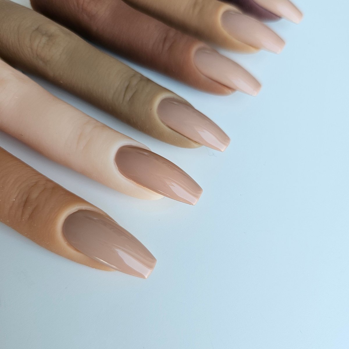 Chic, cool nude beige PressOn nails, perfect for medium to light skin tones, offering a refined, natural look