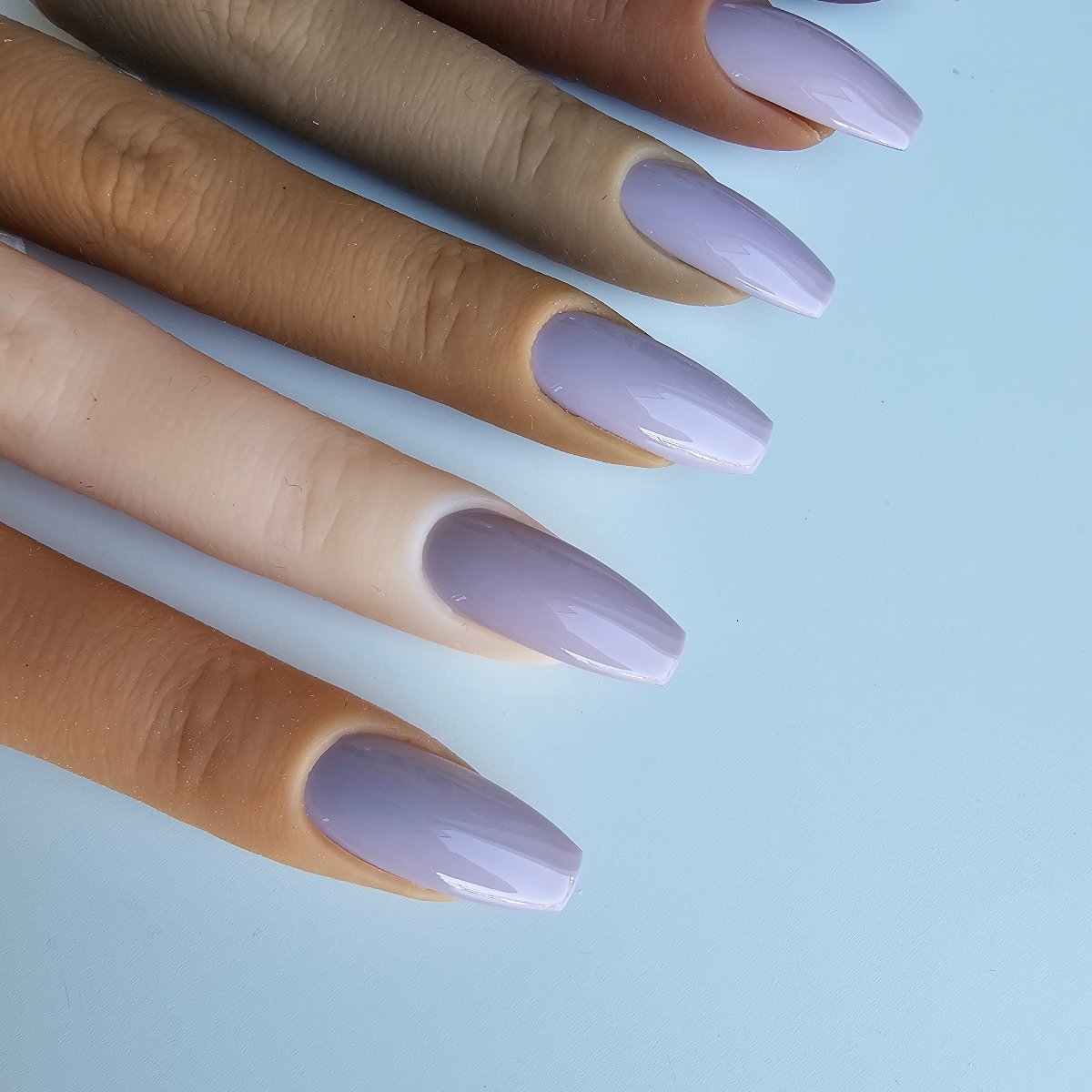 Cool-toned lilac nude press-on nails for all skin tones, a subtle shade perfect for a French manicure base with great coverage