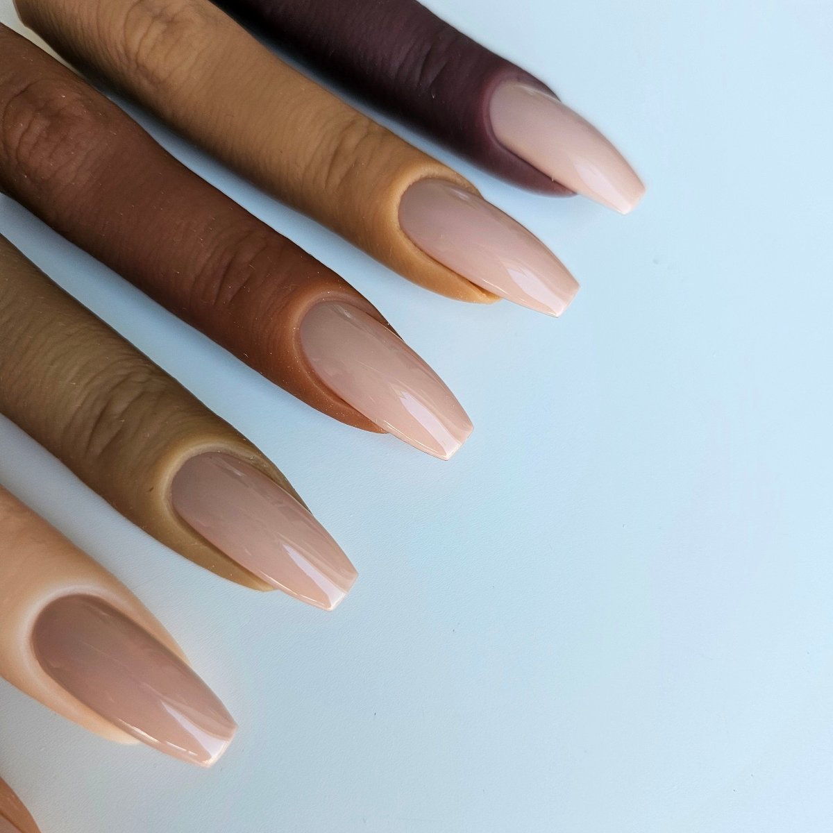 High-quality beige PressOn nails with strong coverage, offering a natural yet striking look perfect for daily wear