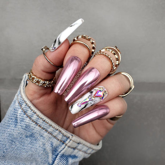 Stylish romantic pink chrome nails with an extravagant femme fatale vibe, exuding a powerful and luxurious look