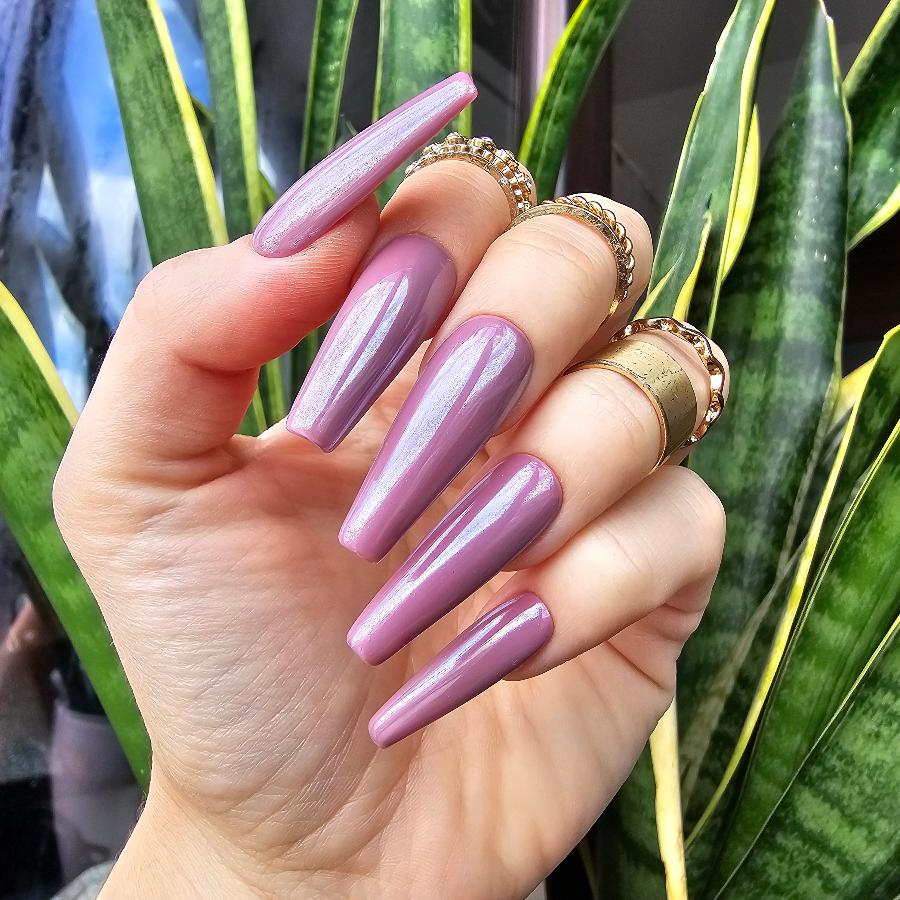 High-shine mauve shimmer press-on nails with a sculpted, glossy finish, resembling chrome glaze; packed in a box of ten salon-quality nails, ready for shipment, medium length