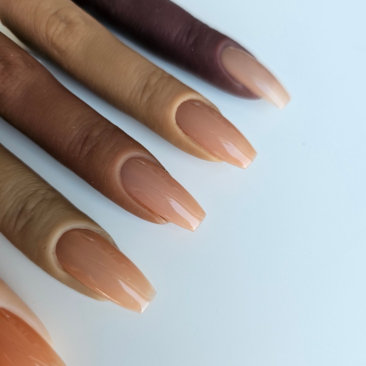 Warm beige nude PressOn nails with a natural, translucent appearance for an elegant French cover effect on your natural nails