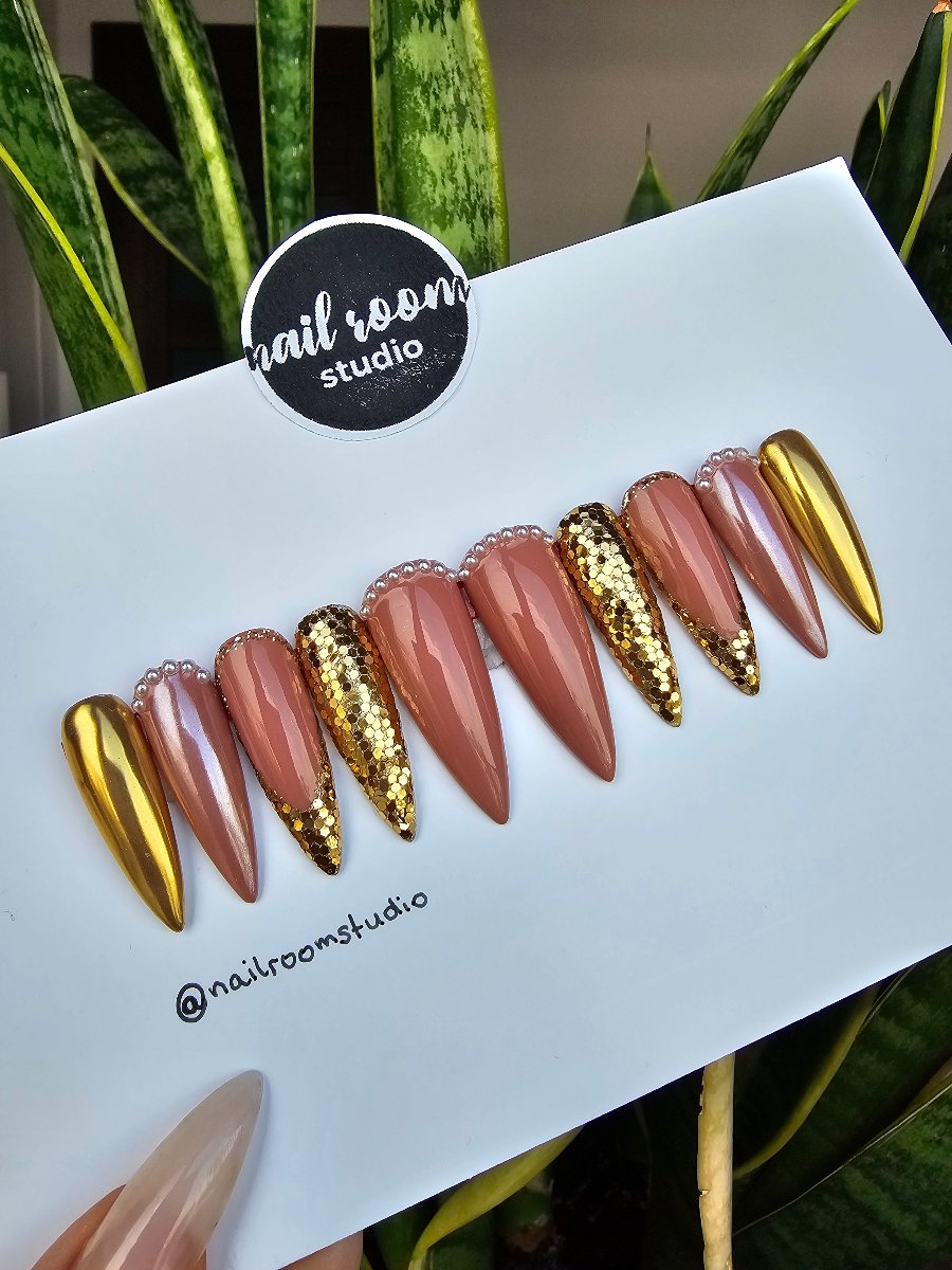 Complete set of Nude Gold Shimmer press on nails, featuring ten elegantly crafted pieces, available for immediate shipping and custom orders worldwide