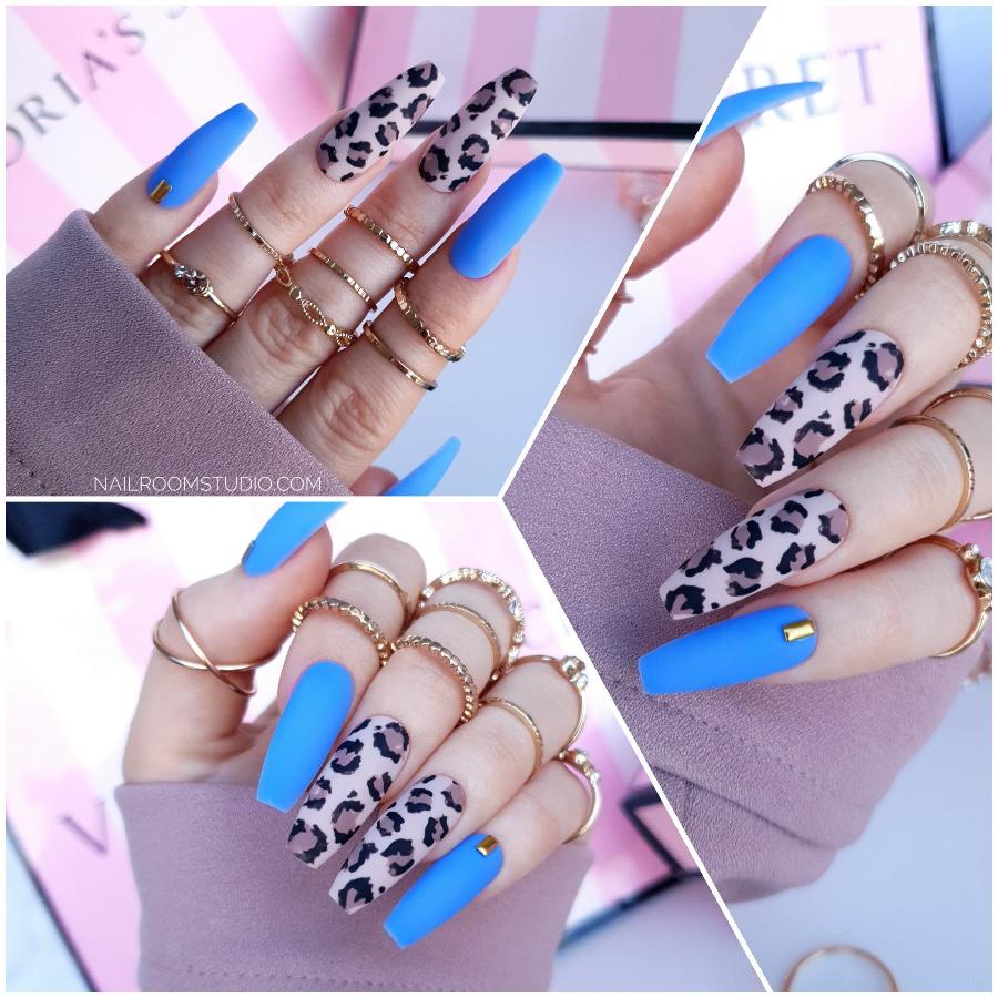 Leopard hand painted print on nude nail bed and matte blue coffin nails