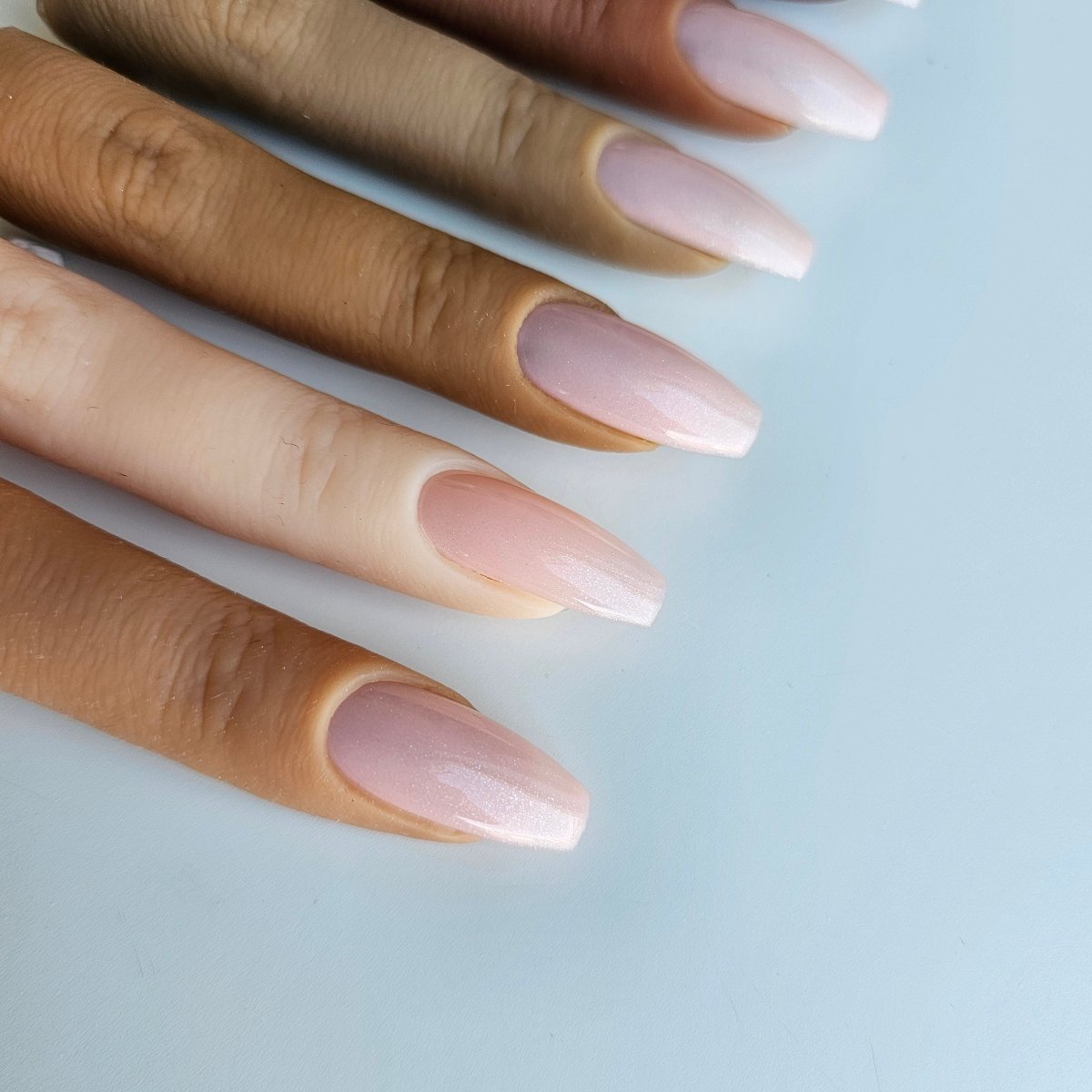 High-quality powdery pastel pink PressOn nails, artificial nails for a fresh, spring-inspired look - complements light to medium skin