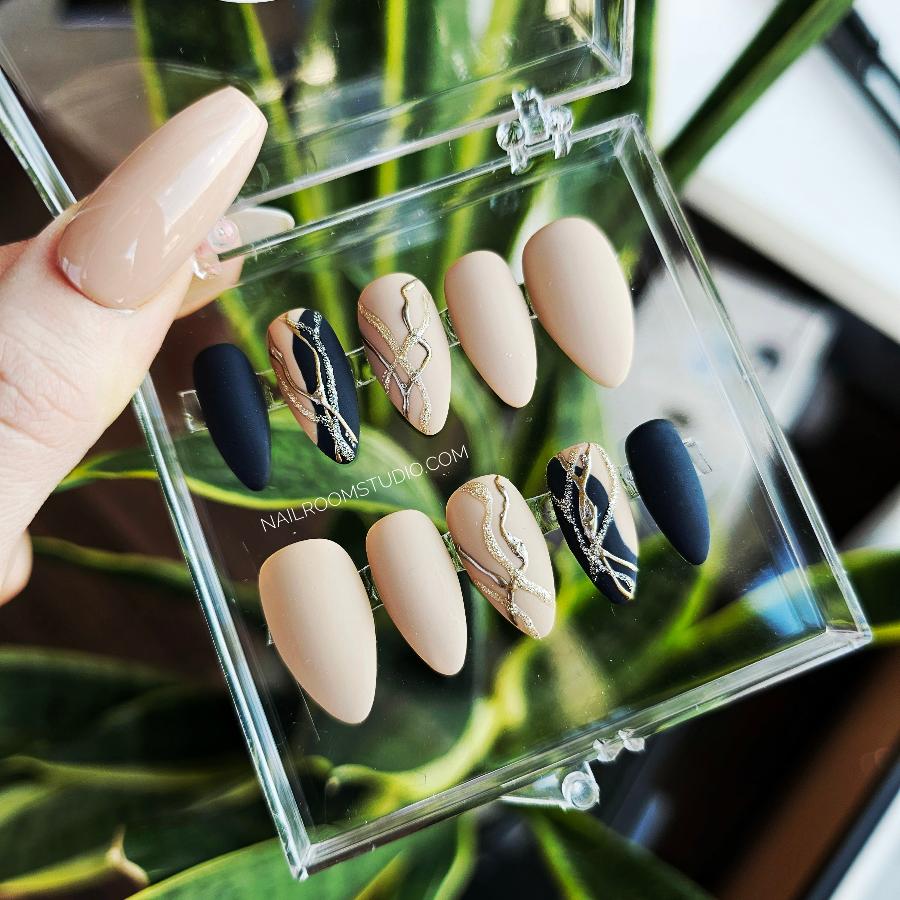 Black and gold PressOn nails, sophisticated design ready for shipment, nude matte accents added, all presented in clear box