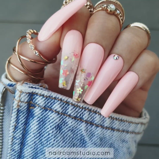 Elegant summer nails for short nails in pastel pink with ombre, feathered flowers  and glitter accents, featuring a partially transparent tops, perfect for spring and summer, by Nail Room Studio