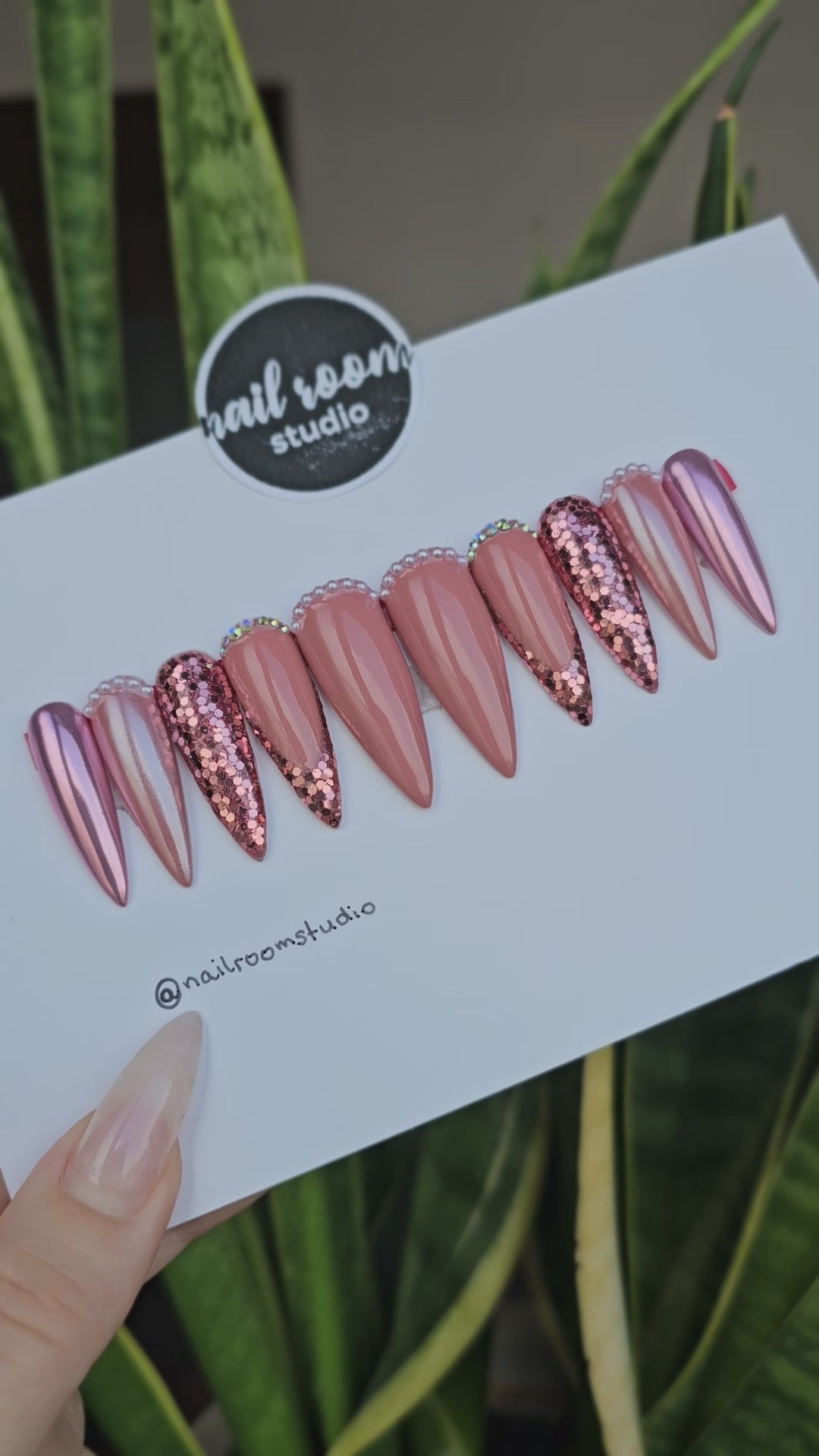 Stunning Shimmer press on nails in shades of pink champagne, gold, and nude, featuring intricate details like crystals and glitter for a glamorous finish