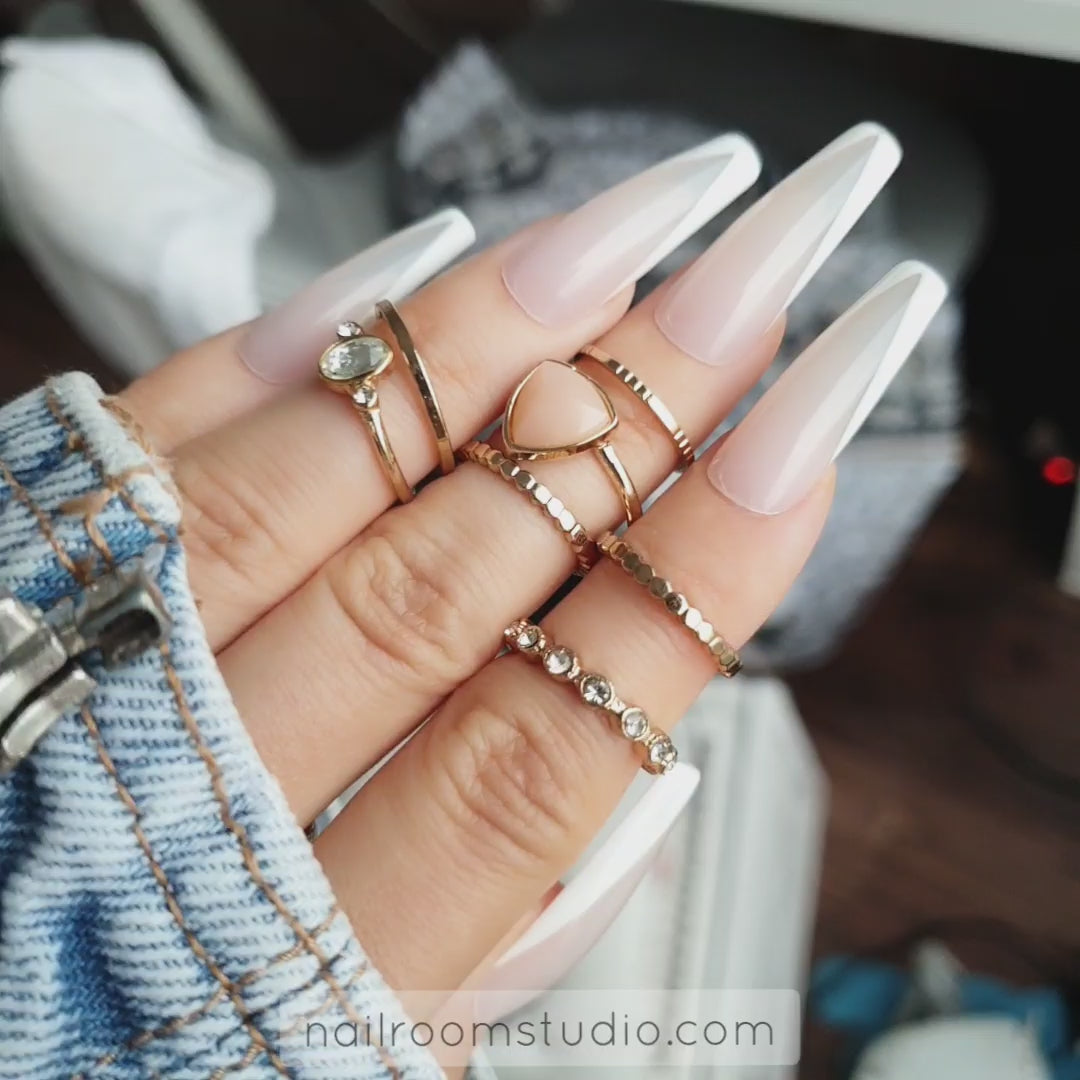 Natural nude pink shadefalse glue on nails in extra long sculpted coffin shape, manufactured by professional nail technican from Nail Room Studio